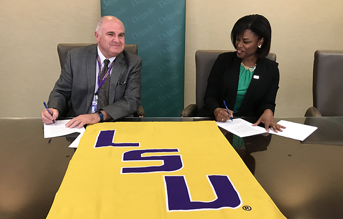 signing LSU Health New Orleans - Delgado nursing education agreement